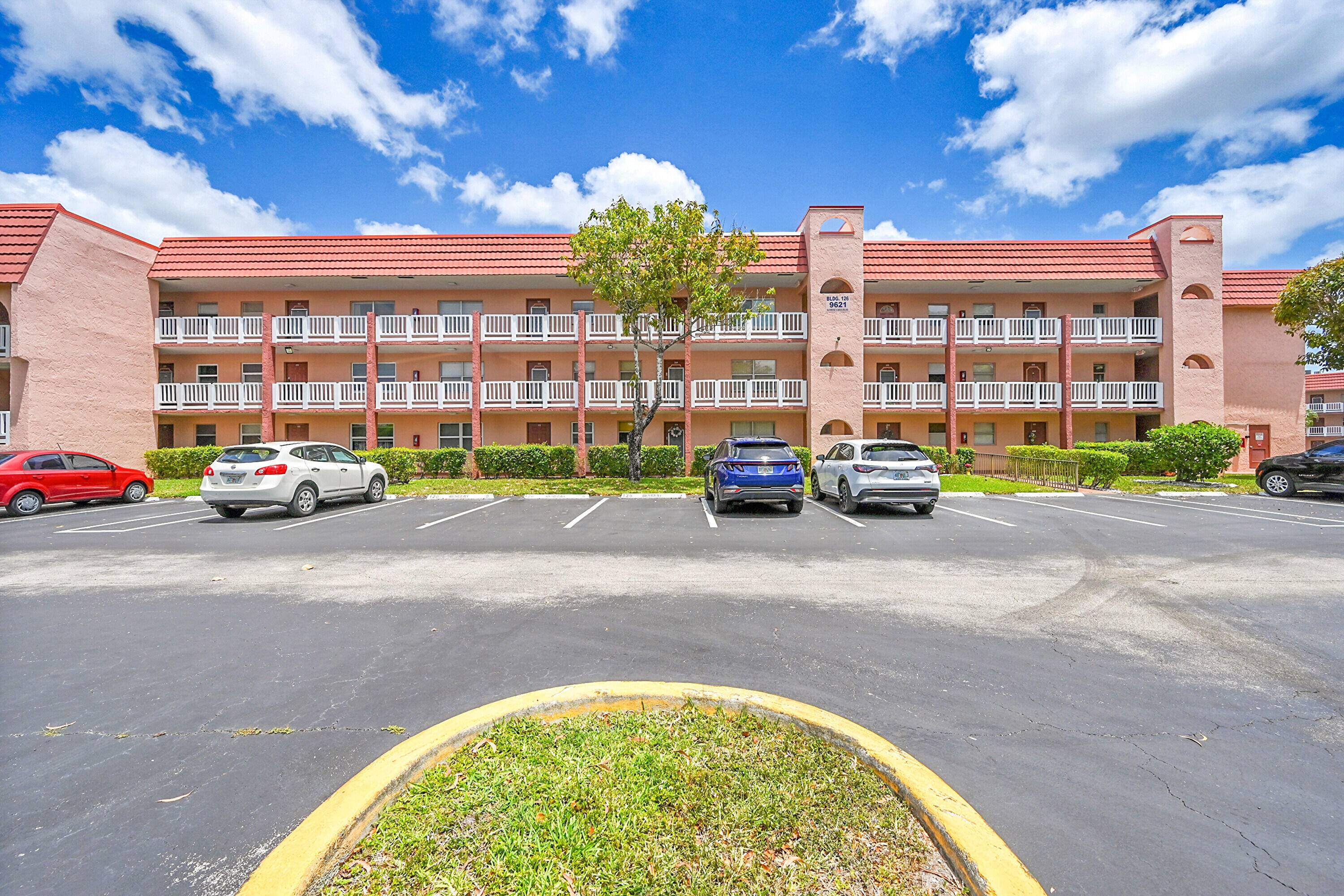 Move in ready, 2 bedroom, 2 bath first floor condo offers a spacious layout with a covered and screened Florida Room overlooking serene views.