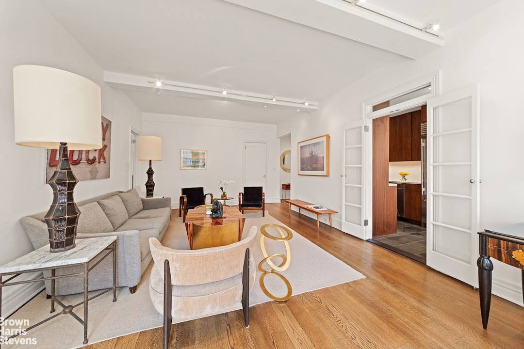 A thoughtfully renovated two bedroom, two bath home with mid century modern sensibility in one of the Upper West Side's most sought after cooperatives.