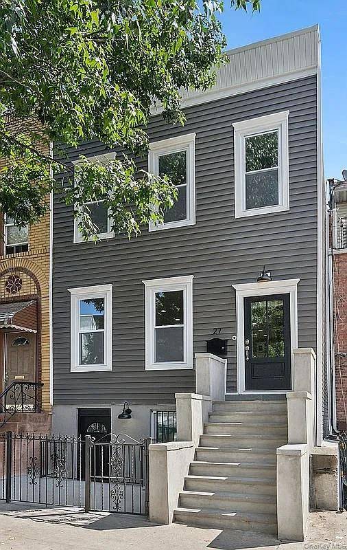 Welcome to 27 Monaco Place Where Modern Design Meets Timeless Comfort Step into this stunningly renovated 18.