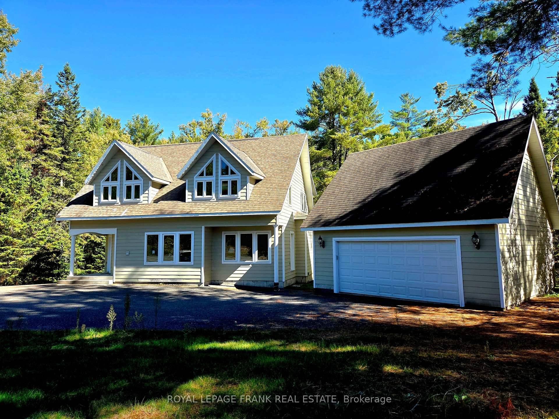 EELS CREEK Beautifully appointed home sitting on over a half acre point lot with the amazing sound of the terrific rapids on one side and great swimming canoeing on the ...