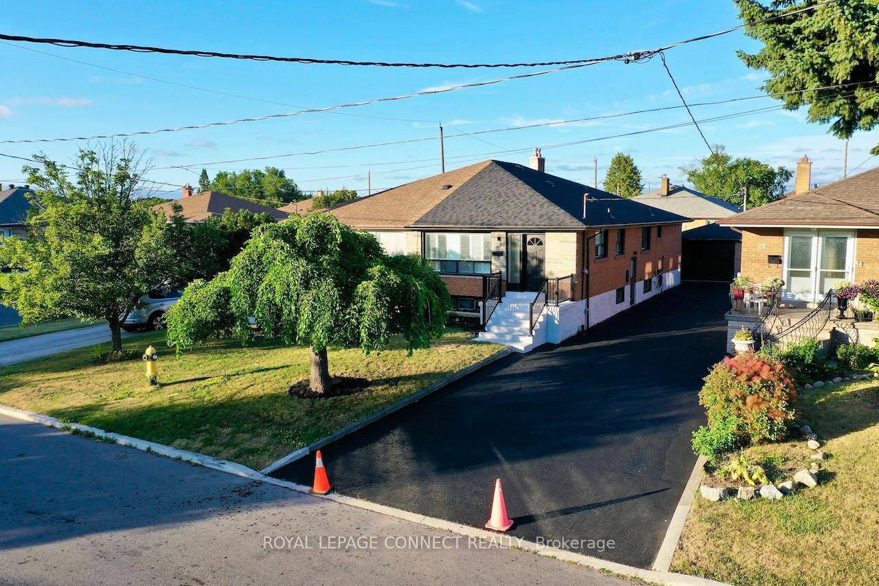 Tastefully renovated all brick bungalow with separate entrance to accessory apartment for income potential or in law suite.