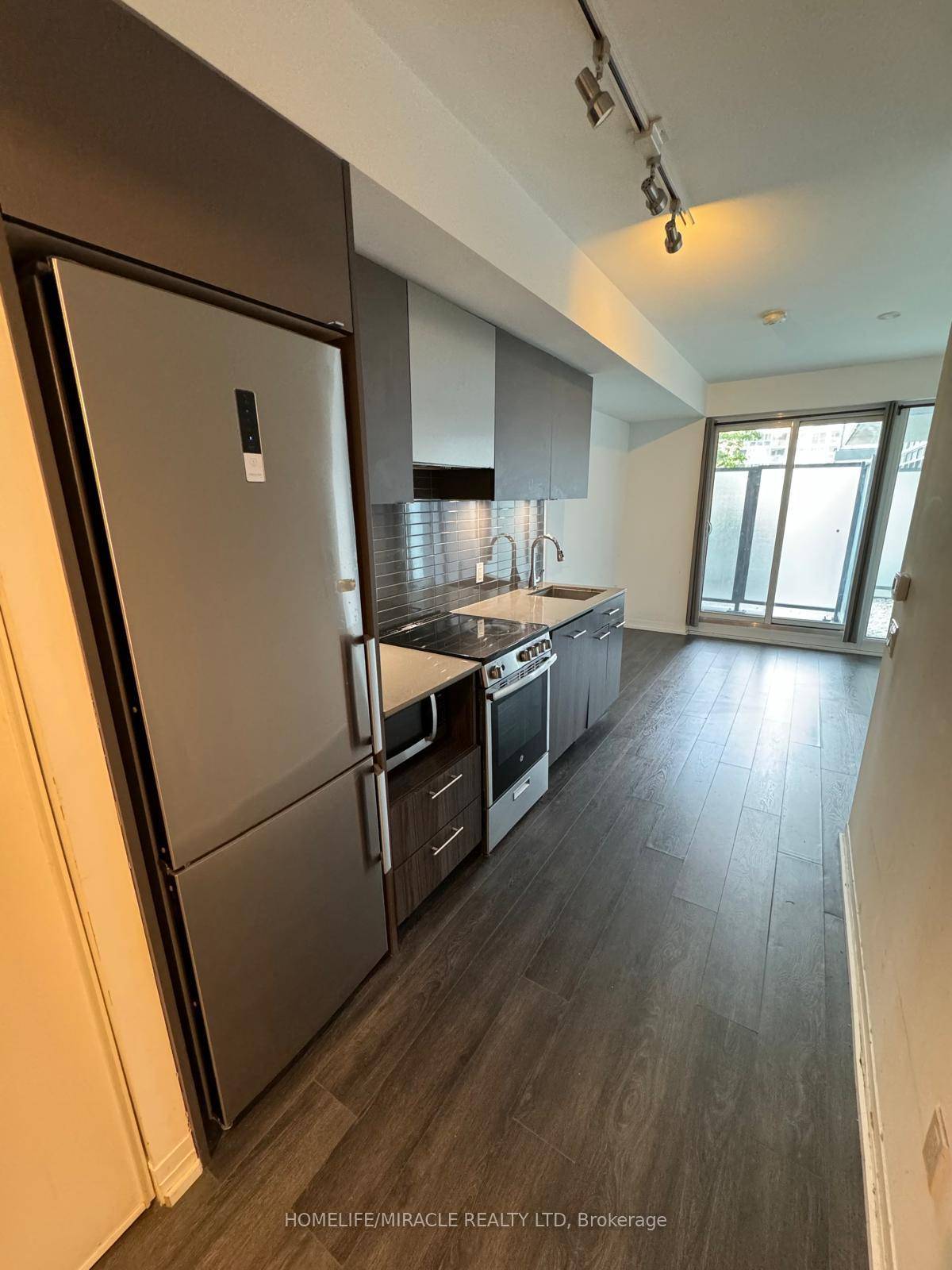 Functional Executive Bachelor Style Furnished Suite with Bed, Mattress amp ; study table.