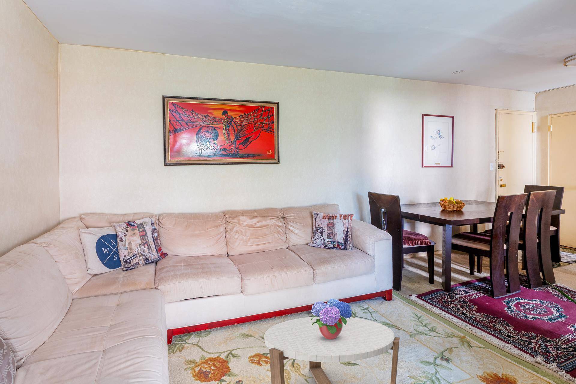 Welcome to a charming and delightful condo located at 100 25 Queens Boulevard in the vibrant neighborhood of Forest Hills.