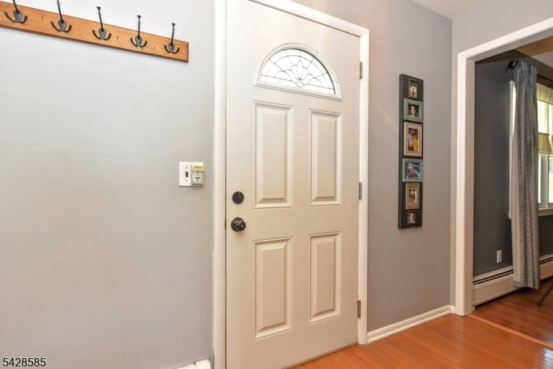 Welcome to this wonderful Center Hall Colonial residence located within the Ramsey Golf Country Club, a lifestyle community.