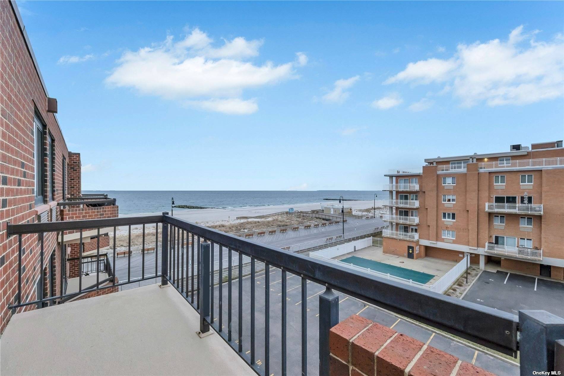 Nestled atop the shimmering coastline, this penthouse offers breathtaking 180 degree, western exposure.