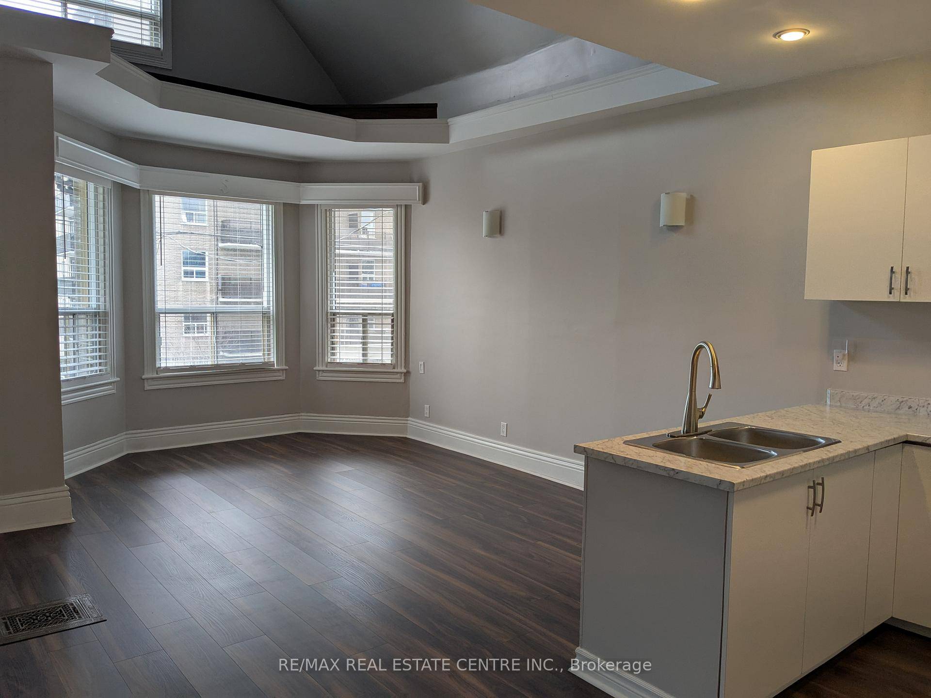This completely renovated, spacious and immaculate apartment combines century charm with a modern touch.