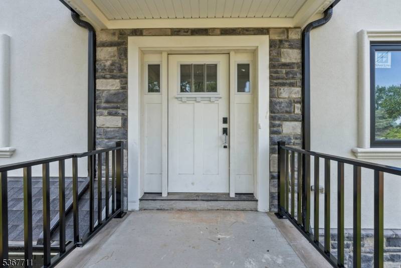 Spectacular custom new construction home in the most sought after Whispering Hills neighborhood of South Plainfield.