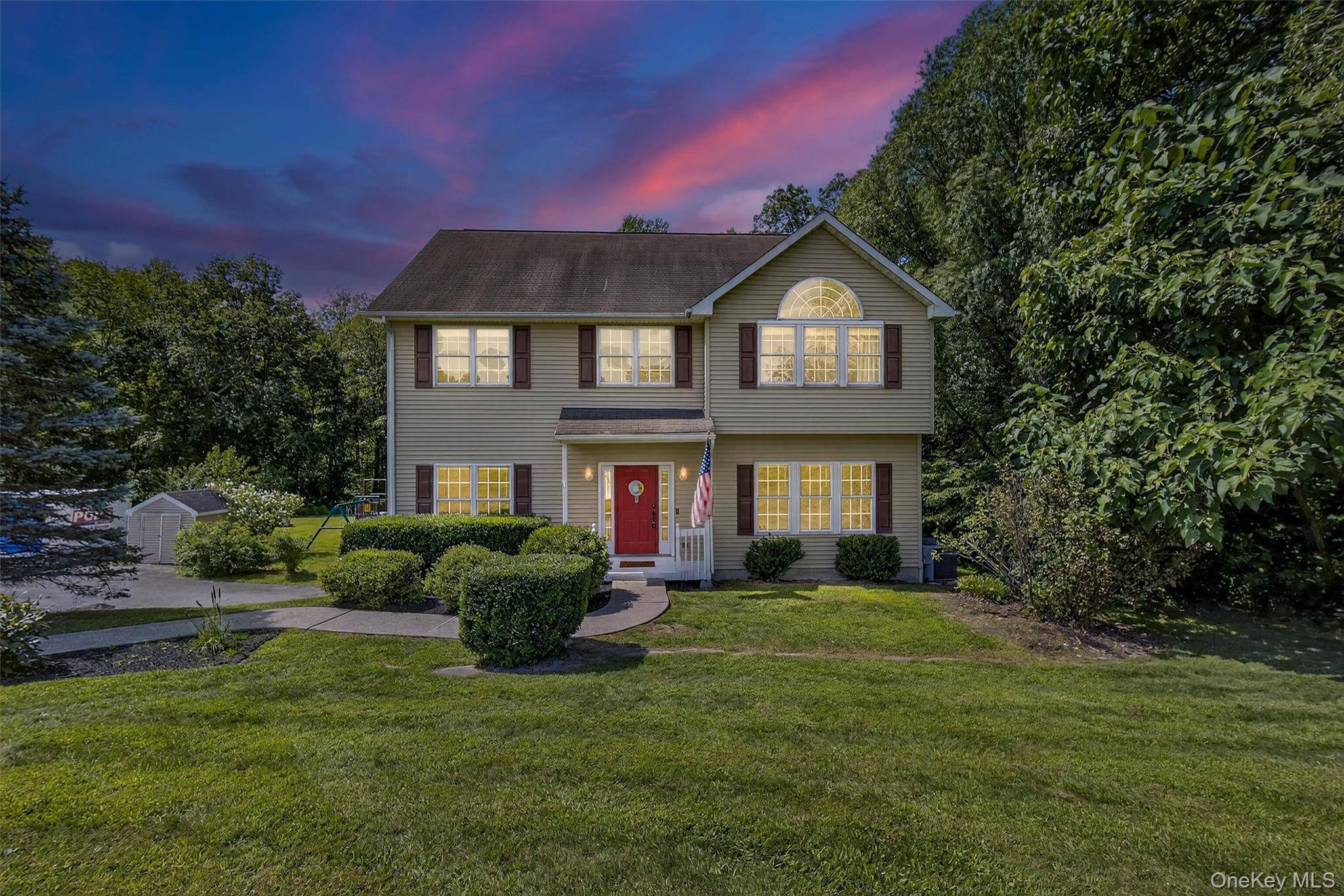 Tucked away at the end of a quiet cul de sac, this property offers a peaceful retreat with a backdrop of over 6 acres of mature woodlands.