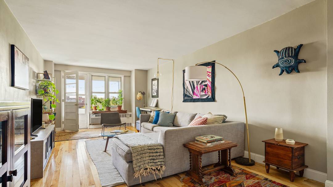 Rare, three bedroom, two bath apartment with a terrace and assigned parking !