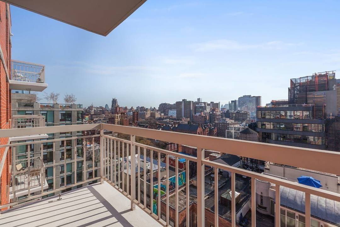 Private balcony overlooking the High Line with beautiful city and Hudson River views.