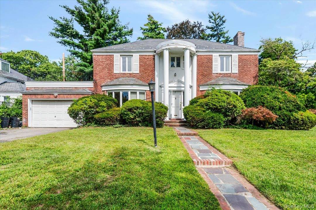 Welcome to this gracious Center Hall Colonial located in the heart of Great Neck in the coveted Saddle Rock Estates.