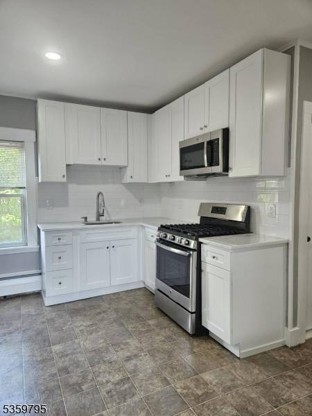 nice renovated 2 family house, close to shopping, public transportation, restaurants