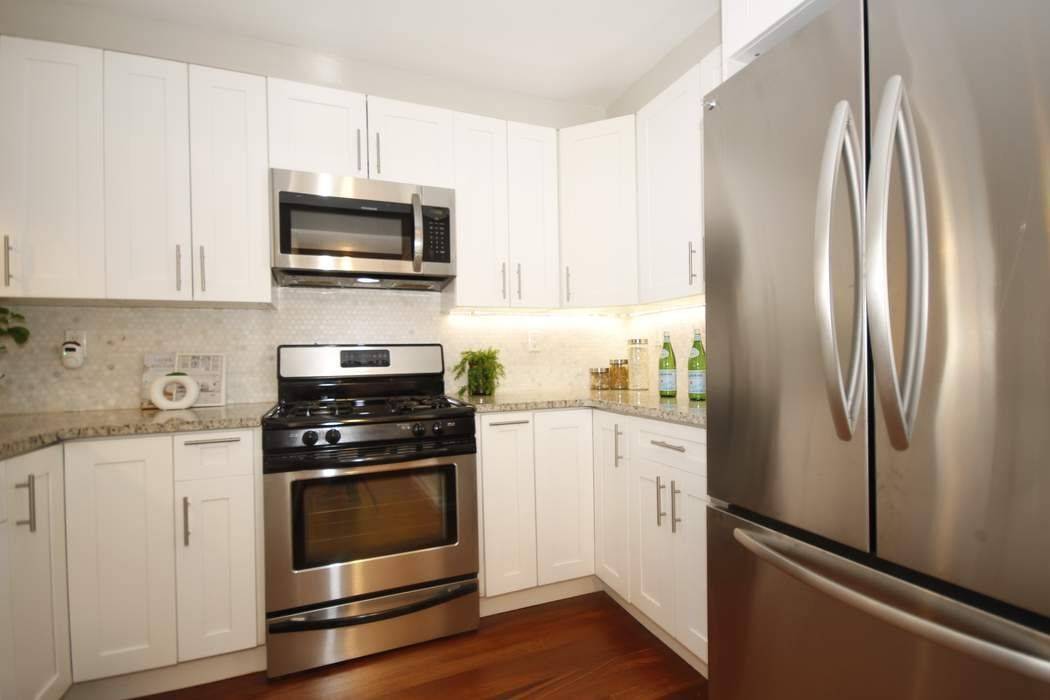 Huge, comfortable and unlike any full floor through townhouse you will ever see.