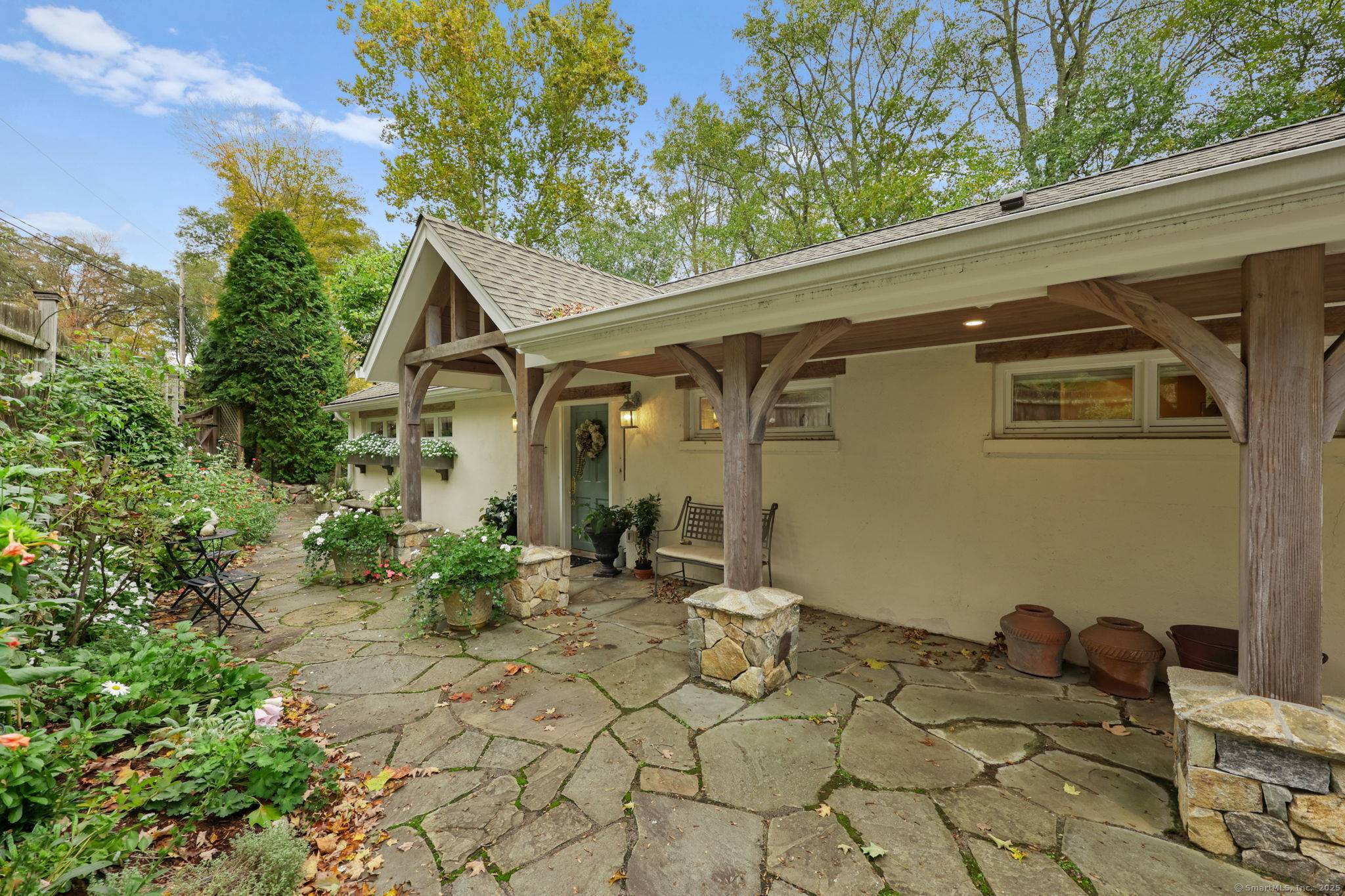 Welcome to 256 Mill Road, a charming and enchanting home nestled on a picturesque country road.