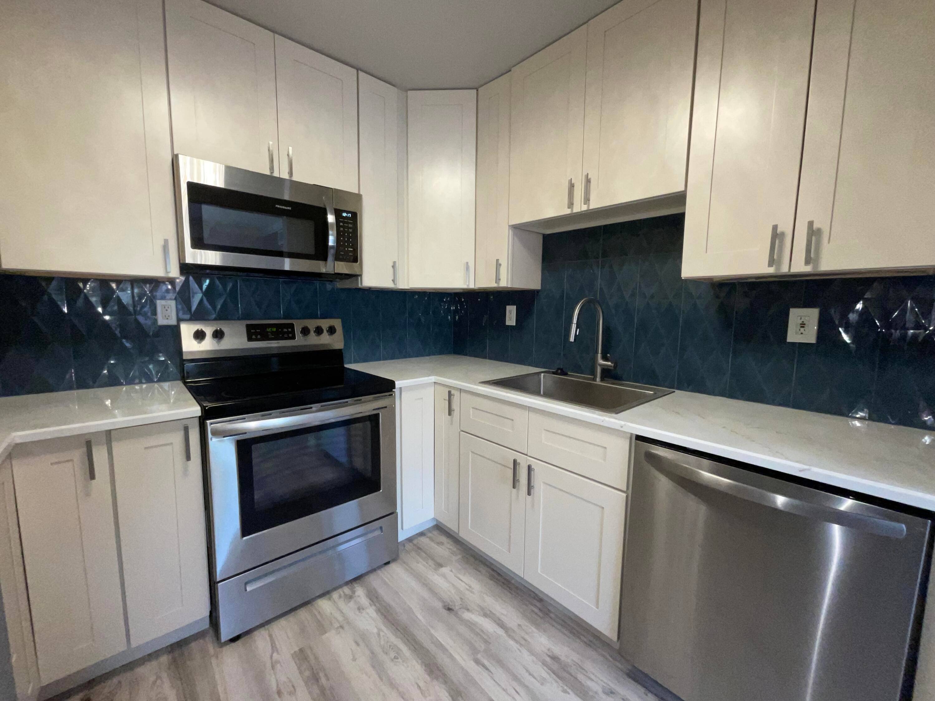 Nestled in the sought after Kings Point County Club community, this corner condo offers a luxurious and convenient lifestyle.