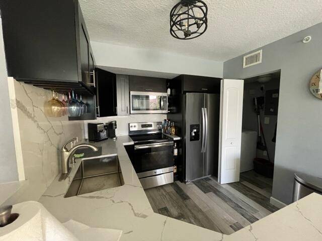 Tenant occupied till 6 2026 Investors welcome FHA VA approved tastefully decorated, fully furnished turnkey Gated community, 3 bedroom, 2 bath unit that has a Lake view overlooking a resort ...