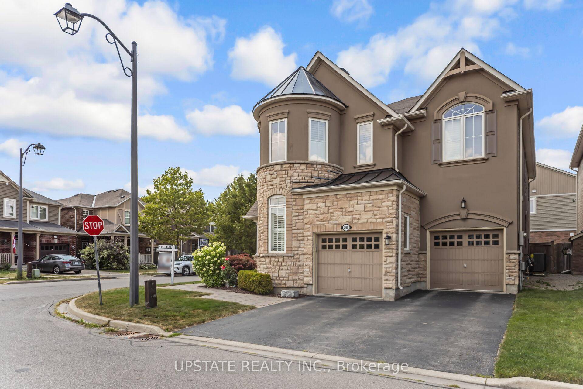 Immaculate amp ; Exceptionally Well Cared For Home with a 4 2 Bedroom Legal Walk Up Basement Apartment, offering the perfect blend of style, functionality, and income potential.