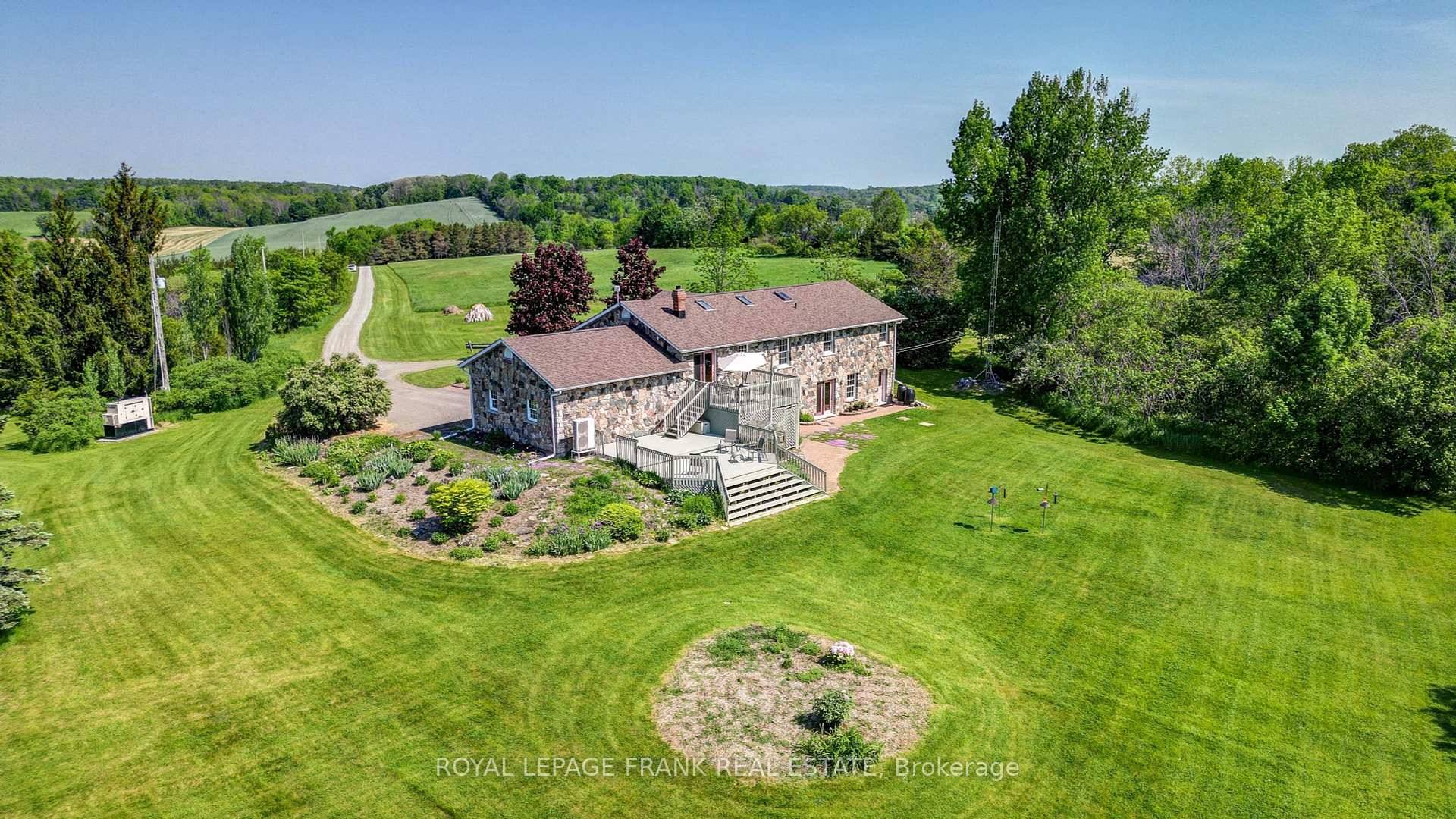 TRENT HILLS Gorgeous, Granite stone raised bungalow, set in privacy on a spectacular 50 acre parcel.