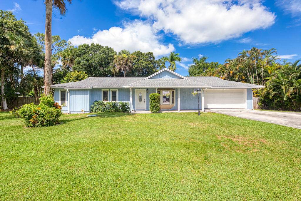 Welcome to your corner lot home nestled in the heart of Stuart !