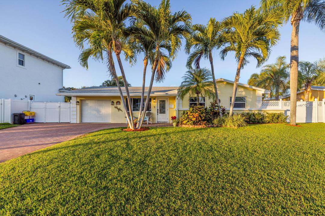 Set along a deep water canal on a quiet cul de sac within one of North Palm Beach's most established, family friendly streets, this waterfront residence reflects a calm, considered ...