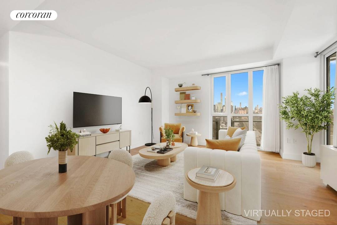 Now available as a resale, this stunning corner 2 bedroom, 2 bathroom condo in Long Island City combines sleek modern finishes with bright, airy living.