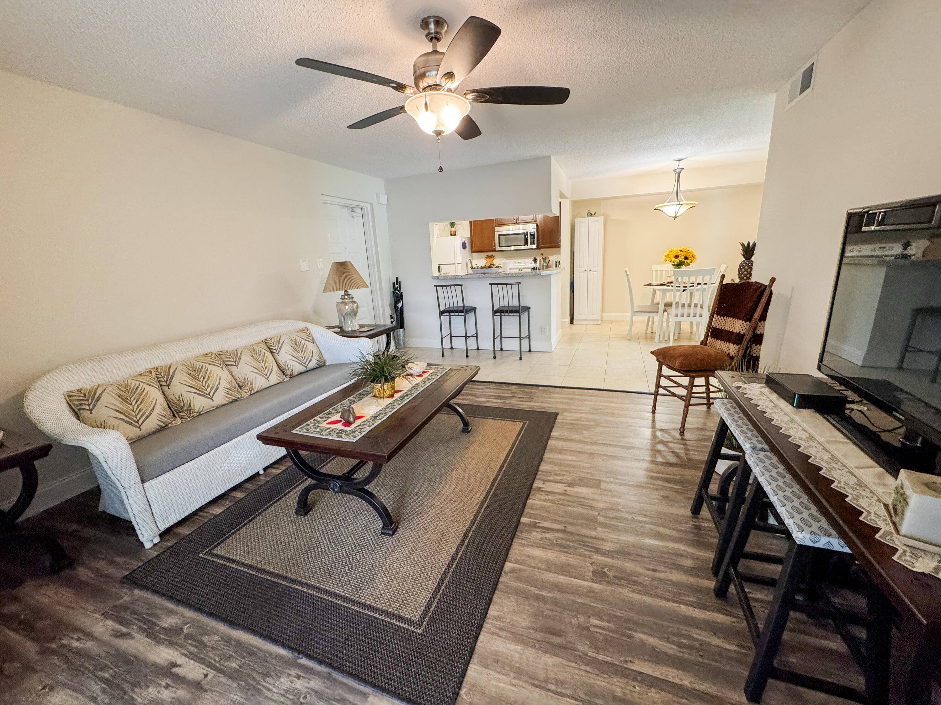 PRICED TO SELL First Floor Income Opportunity Riverfront Community w Ocean Access !