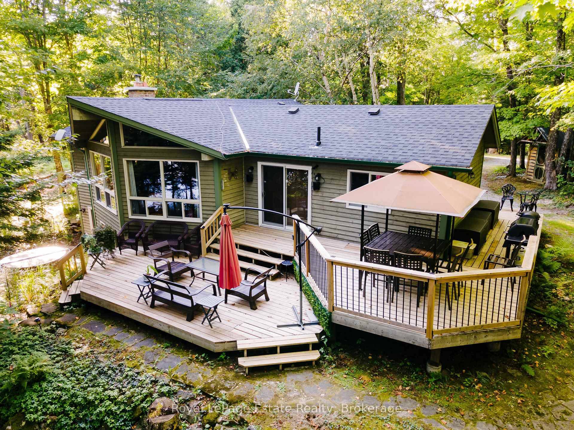 Experience the ultimate in lakeside living at this serene cottage retreat on Soyers Lake, part of a picturesque 5 lake chain offering miles of boating.