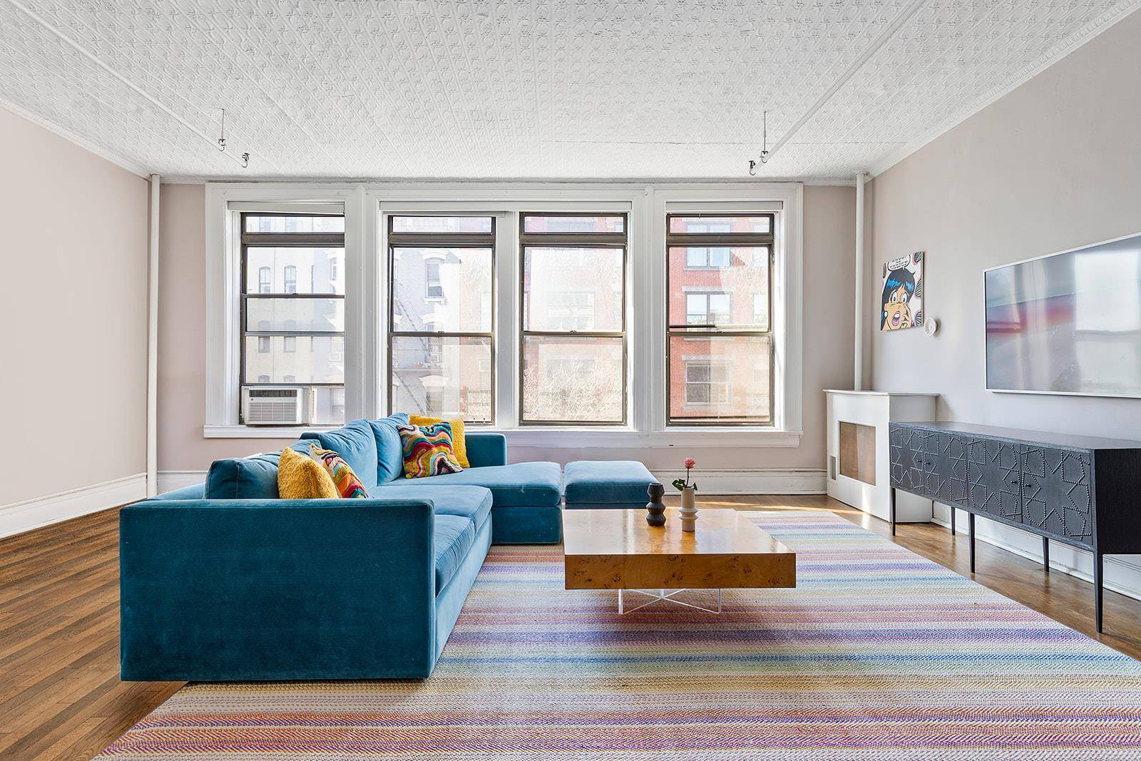 Welcome to this sprawling, one of a kind authentic full floor loft in Manhattan's most desirable and vibrant neighborhood.