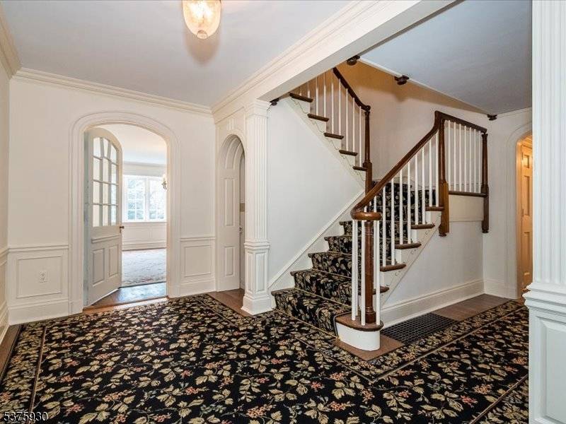 Live, work and entertain with ease in this impeccably maintained and beautifully appointed Colonial situated on 1.
