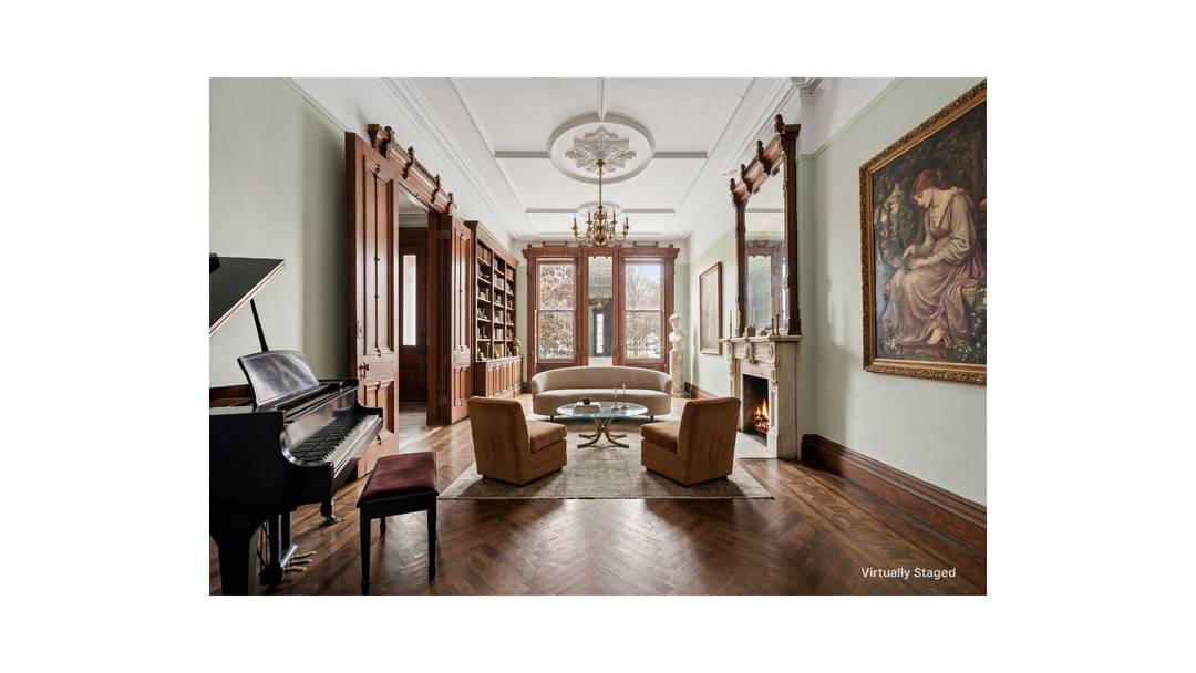 7 East 124th Street presents a rare opportunity to reimagine a 20 foot wide, park front Italianate townhouse in one of Harlem's most iconic settings.