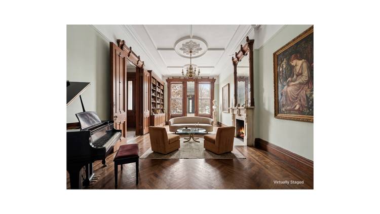 7 East 124th Street presents a rare opportunity to reimagine a 20 foot wide, park front Italianate townhouse in one of Harlem's most iconic settings.