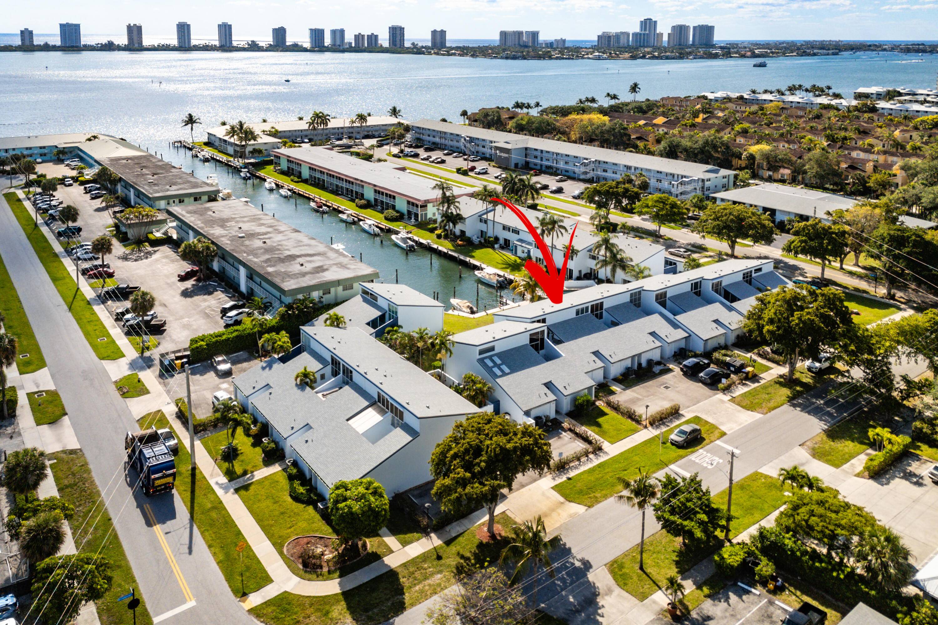 On the intercoastal waterway with access to boat dockage and the Palm Beach inlet this is a chance to make this town home your very own with your totally new ...