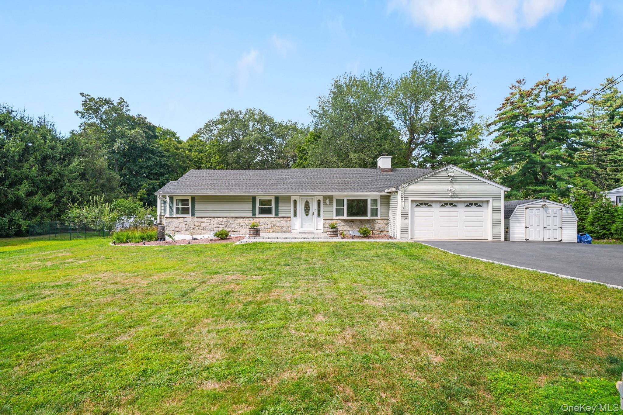 Bring your vision to this ranch style home on an oversized, flat 1.