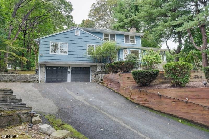 A bright and airy custom home, perfectly positioned to offer a vibrant lifestyle in the highly desirable Mountain Lakes community.