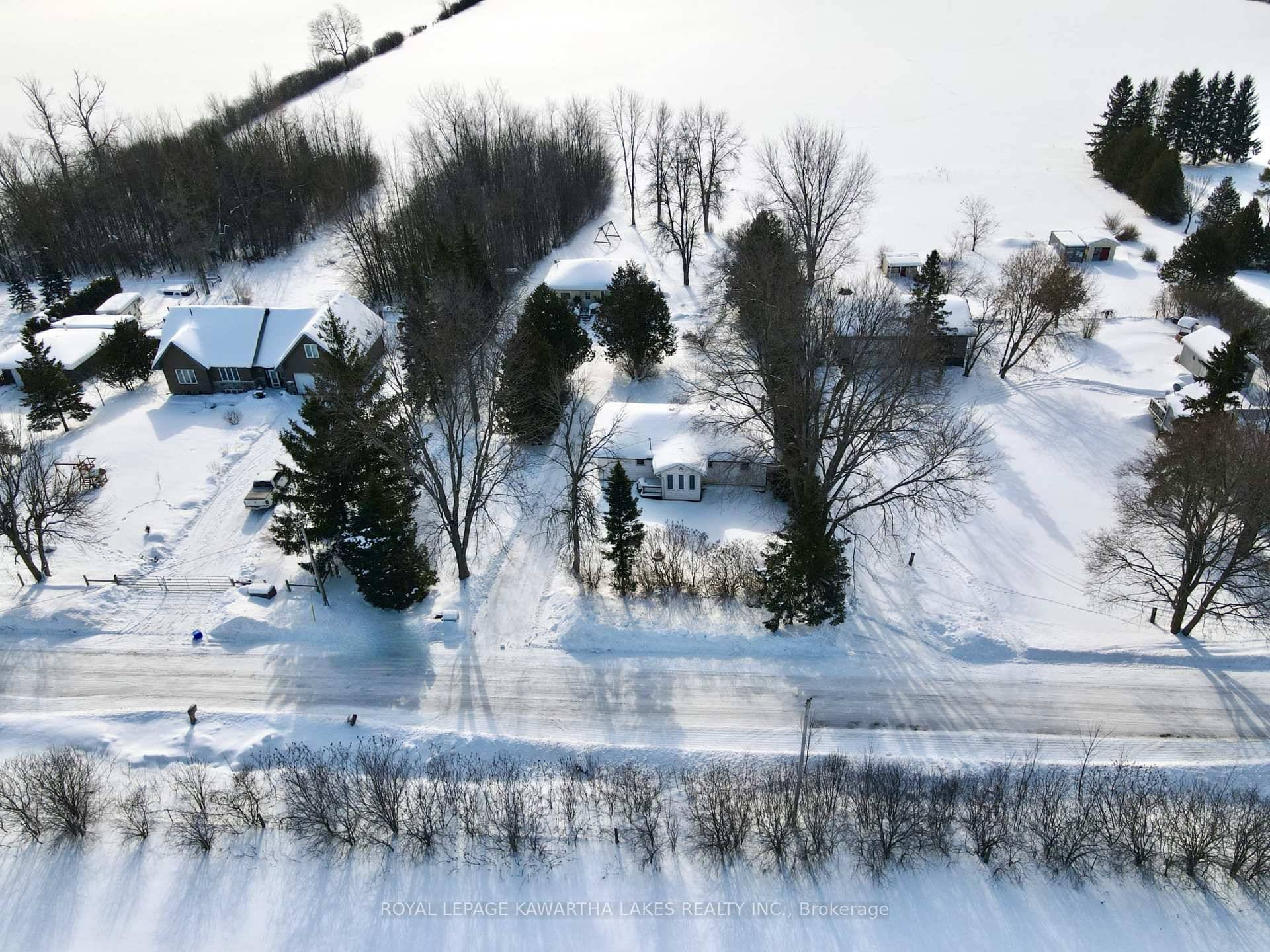 Unique Opportunity With This Property With Two Homes Set on a Serene Almost 4 Acres on a Quiet Concession Road, Just Outside of Town.