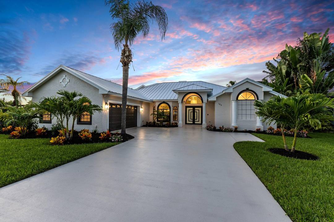 Nestled in the exclusive gated community of Osprey Ridge, this spectacular waterfront masterpiece has been completely remodeled to perfection.