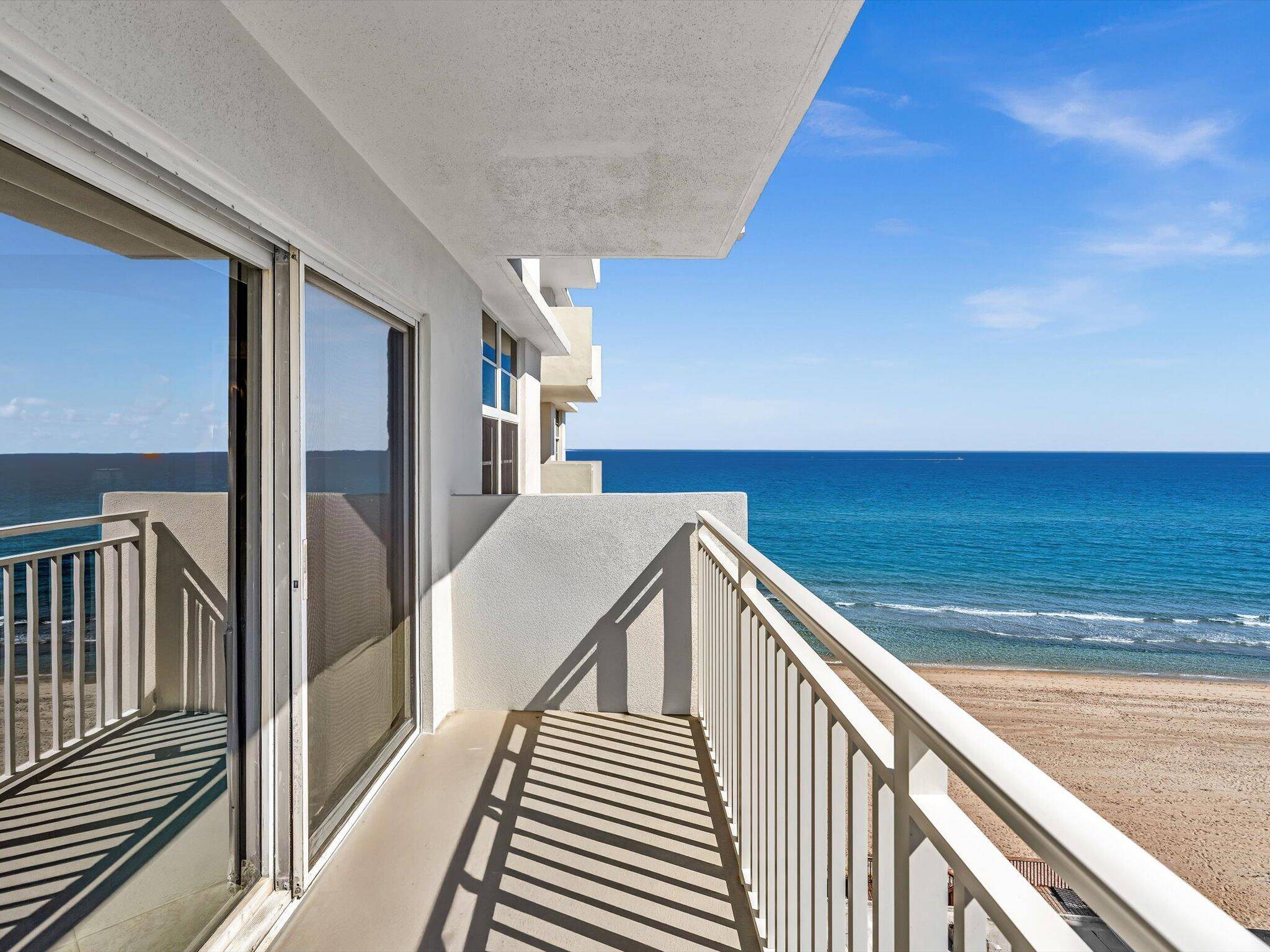 Wake up to breathtaking OCEAN VIEWS in this beautifully appointed FULLY FURNISHED 2 bedroom, 2 bathroom oceanfront condo in Highland Beach.