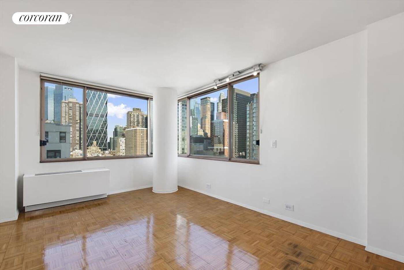 Residence 18i at 350 West 5oth Street is a sunny corner one bedroom with spectacular unobstructed North East views of the Manhattan skyline.