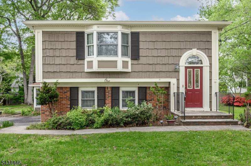 Home Sweet Home ! Lovely 4 Bed 2 Bath Split with 2 Car Garage in Lake Hiawatha could be the one for you !