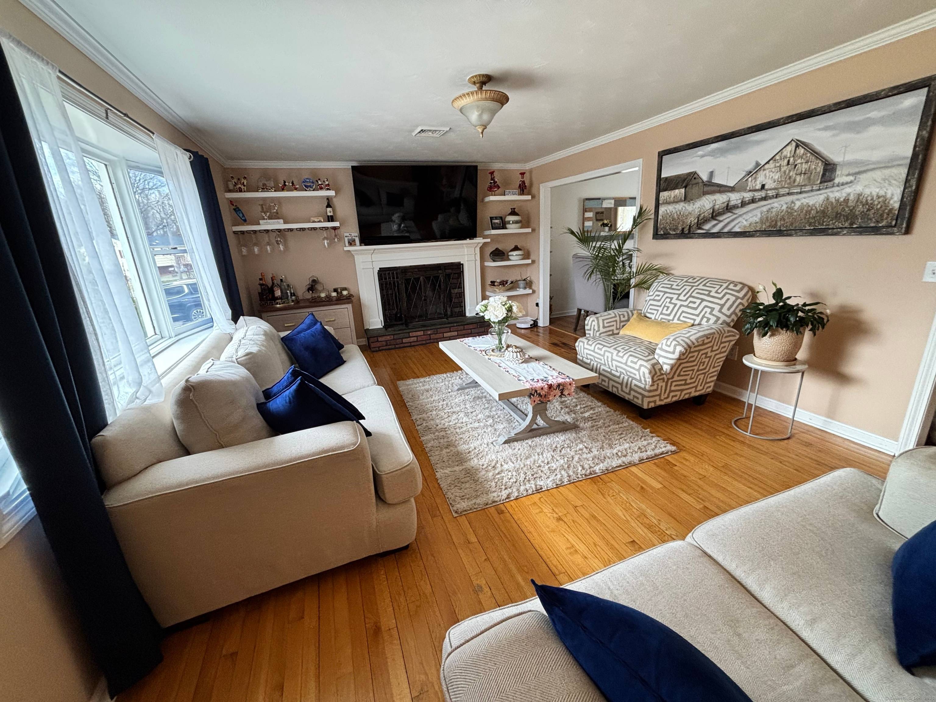 Beautiful high raise ranch, three bedrooms on mail level, living room, dining room, and spacious kitchen.