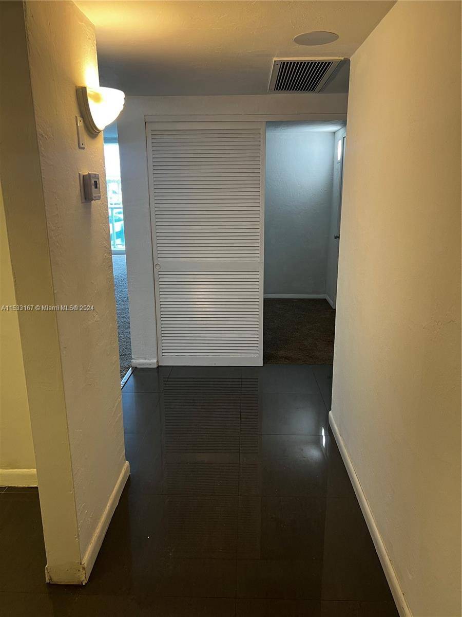 Light filled apartment with brand new floors and multiple fresh upgrades in the heart of Sunny Isles !