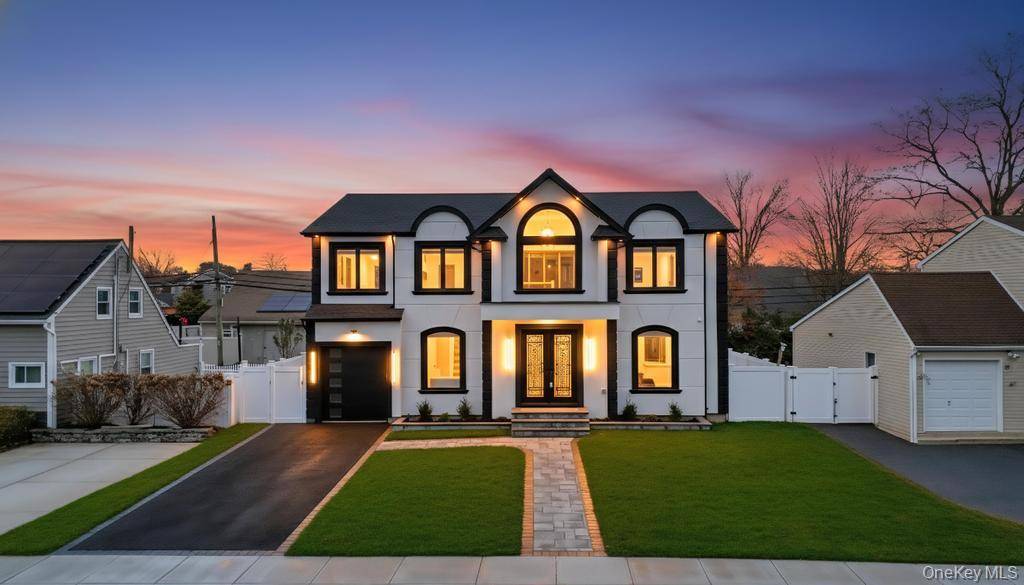 Introducing a Magnificent Stucco facing 5 bedroom, 6 bath Colonial offering over 5200 sq.