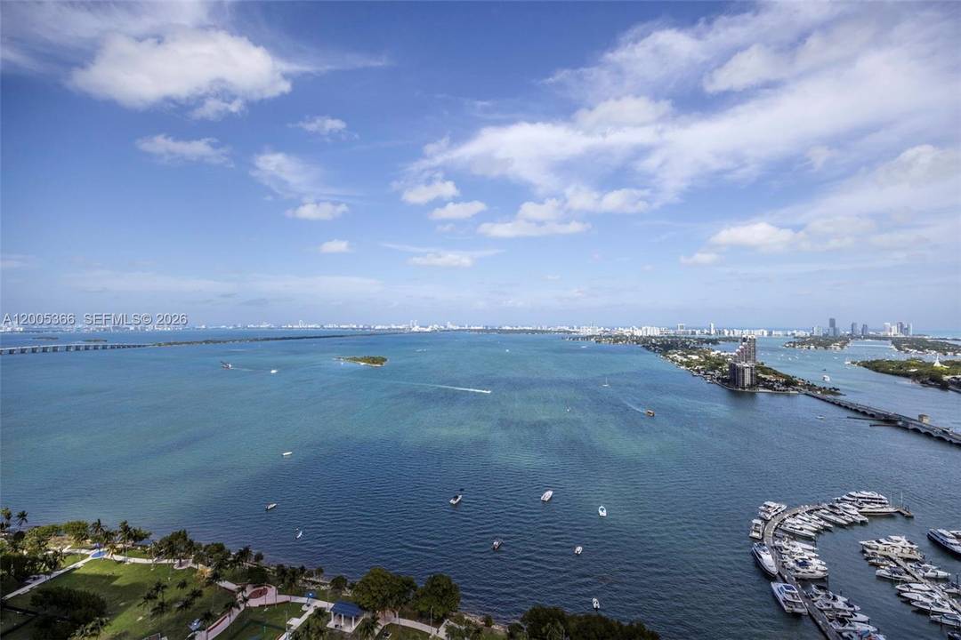 Perched in Opera Tower s coveted 01 line, this 38th floor corner sky residence captures sweeping, unobstructed views of Biscayne Bay, the Atlantic Ocean, and the Miami Beach skyline.