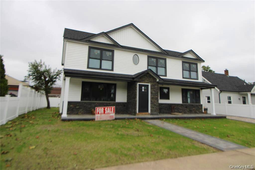 Welcome to this beautiful newly re constructed colonial in Levittown.
