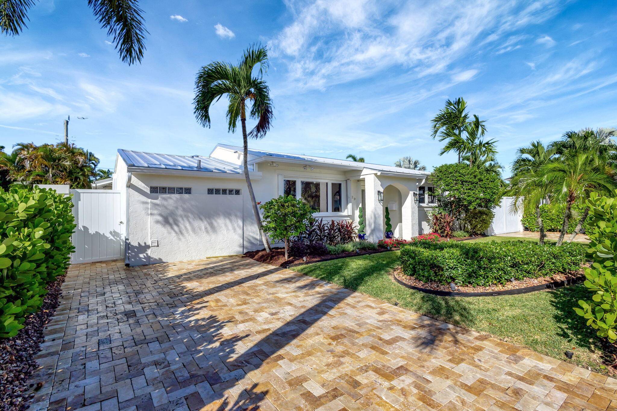 Welcome to 339 Putnam Ranch Rd, West Palm Beach, FL, a distinguished property located in the highly sought after South of Southern neighborhood.