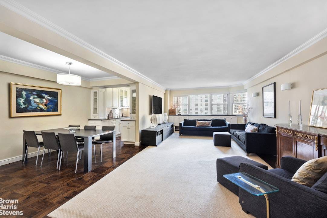 On a high floor with light pouring into every room this spacious 2BR 2BTH home has an oversized living room, huge dining area, washer dryer and marvelous built ins throughout.