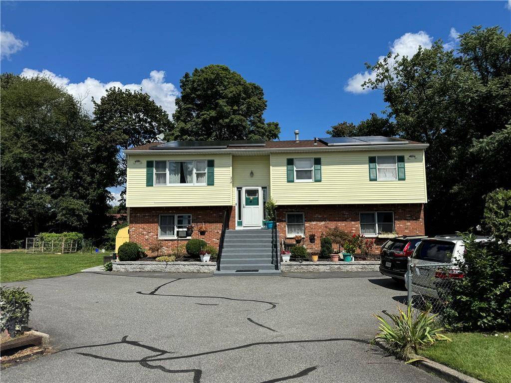 Fully updated 3 bed 2 bath apartment in a two family house with spacious backyard.