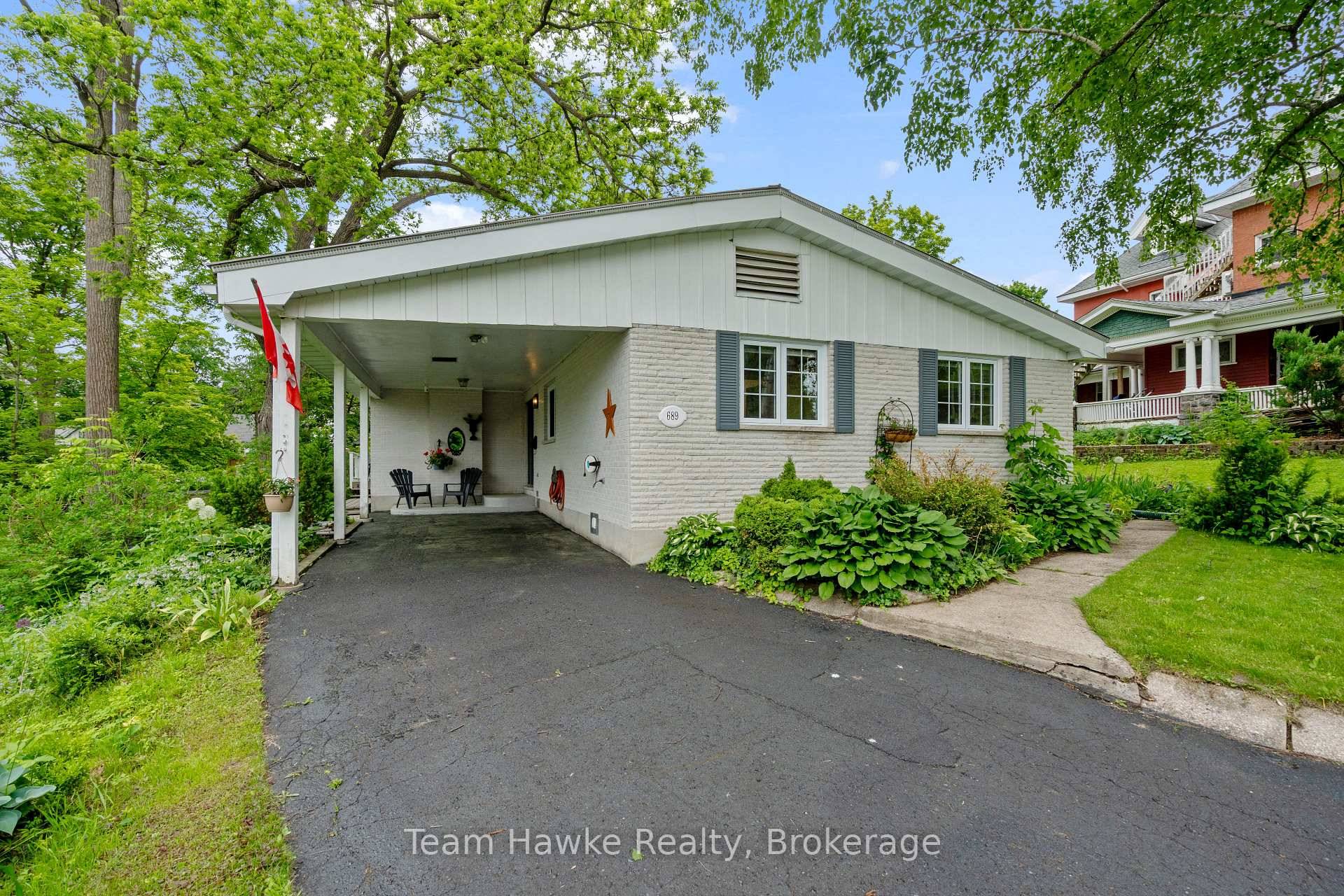 This all brick bungalow blends charm, comfort, and a great central location.