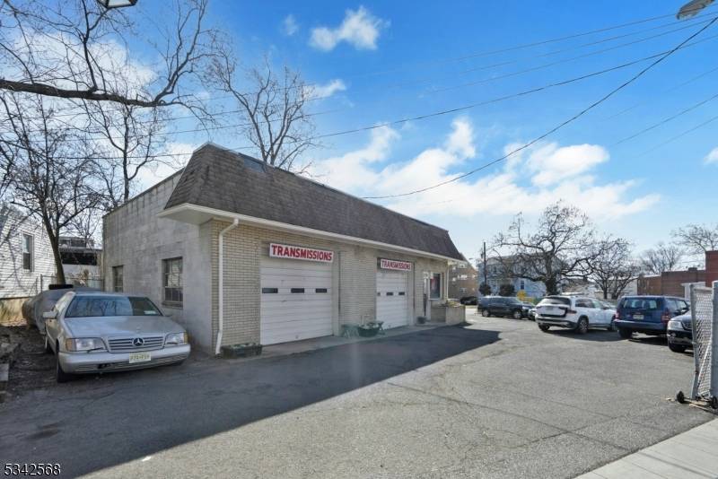 Free standing transmission shop with two bays, small office and bathrooms.