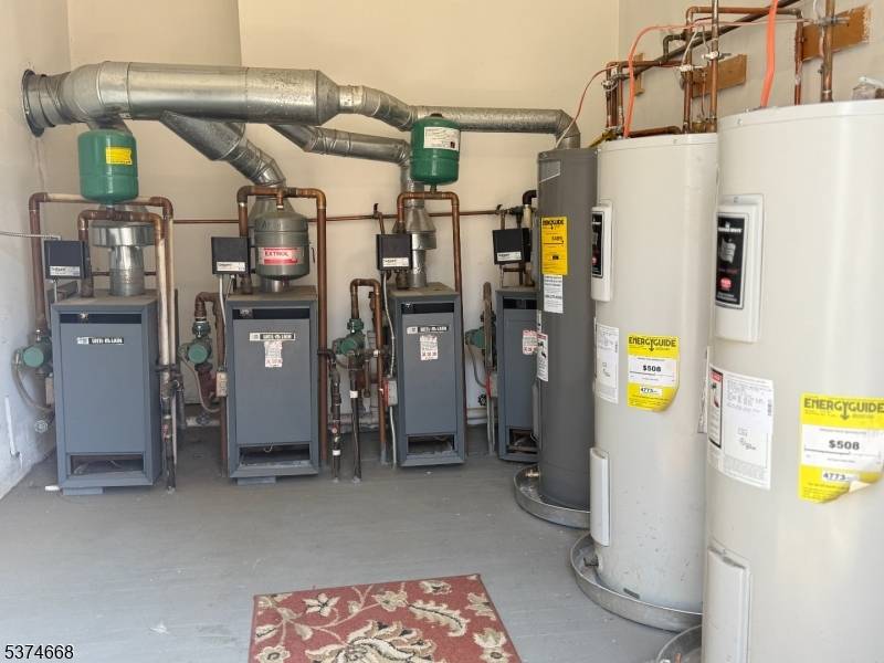 Incredible investment opportunity in a non flood zone this unique multi family property offers five legal units across two separate dwellings, all state of NJ code compliant and featuring separate ...